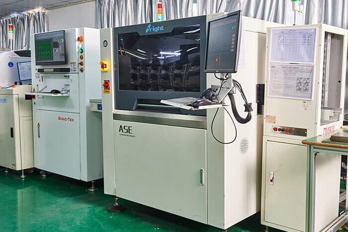 SPI inspection equipment on an electronics production line after solder-paste printing